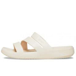 Klapki Crocs Getaway Strappy Z Klapkami Damskie. Białe klapki damskie Crocs, bez wzorów, z materiału, bez obcasa, bez zapięcia. Za 280.99 zł.