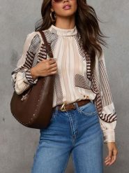 LA Angels Bluzka w kolorze biało-brązowym rozmiar: M. Białe bluzki damskie LA Angels, m, bez wzorów, bez kołnierzyka, bez ramiączek. Za 165.31 zł.