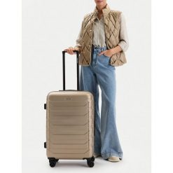 Walizka średnia GINO ROSSI. Żółte walizki Gino Rossi, bez wzorów, średnie. Za 279.99 zł.