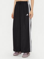 Adidas Spodnie dresowe Essentials 3-Stripes JE1306 Czarny Loose Fit. Czarne spodnie dresowe damskie Adidas, xl, bez wzorów, z dresówki. Za 159.99 zł.