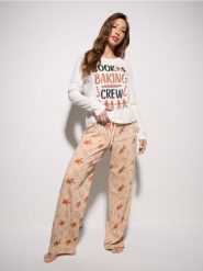 Bawełniana piżama z motywem piernikowego ludzika - biały. Białe piżamy damskie Sinsay, bez wzorów, z bawełny, bez ramiączek. Za 49.99 zł.