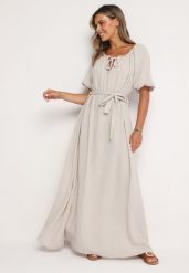 Jasnobeżowa Trapezowa Muślinowa Sukienka z Bawełny z Paskiem i Gumką w Talii Vimarinn. Brązowe sukienki damskie Born2be, bez wzorów, z bawełny, bez ramiączek. Za 149.99 zł.