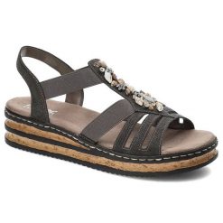 Szare Sandały Rieker Wygodne Buty Damskie. Szare sandały damskie Rieker, bez wzorów, ze skóry ekologicznej, bez obcasa, na koturnie, bez zapięcia. Za 239.00 zł.