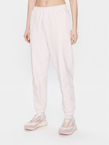 New Balance Spodnie dresowe Athletics Nature WP23553 Różowy Relaxed Fit. Czerwone spodnie dresowe damskie New Balance, xl, bez wzorów, z bawełny. Za 199.99 zł.