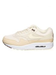 Nike Skórzane sneakersy "Air Max 1 '87" w kolorze kremowo-beżowym rozmiar: 37. Brązowe obuwie sportowe damskie Nike, bez zapięcia. Za 377.74 zł.