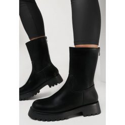 Czarne Botki Phenope. Czarne botki damskie Born2be, z jeansu, przed kolano, bez obcasa, na płaskiej podeszwie, bez zapięcia. Za 74.99 zł.
