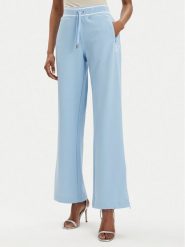 Juicy Couture Spodnie dresowe Kurt JCSBJ224418 Błękitny Regular Fit. Niebieskie spodnie dresowe damskie Juicy Couture, l, bez wzorów, z dresówki. Za 349.99 zł.