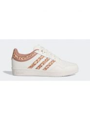 Adidas Sneakersy w kolorze kremowym rozmiar: 39. Brązowe obuwie sportowe damskie Adidas, bez zapięcia. Za 205.45 zł.