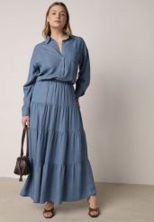 Niebieska Rozkloszowana Spódnica z Lyocellu z Wysokim Stanem i Falbanami Emorithia. Niebieskie spódnice damskie Born2be, na co dzień, bez wzorów, z lyocellu, klasyczne, maxi. Za 99.99 zł.