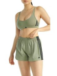 Adidas Szorty w kolorze zielonym rozmiar: L. Zielone szorty damskie Adidas, bez wzorów, z bawełny. Za 47.82 zł.