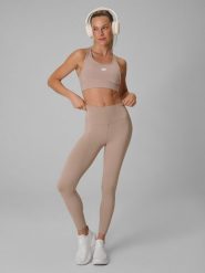 4F Legginsy treningowe szybkoschnące damskie - beżowe S. Brązowe legginsy damskie 4F, s, bez wzorów. Za 119.99 zł.