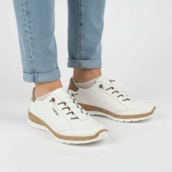 Półbuty damskie Rieker, cholewka ze skóry naturalnej gładkiej sportowa forma klasyczne sznurowanie lekka elastyczna podeszwa, białe, N42K5-80. Białe obuwie sportowe casual damskie Rieker, ze skóry, bez zapięcia. Za 369.00 zł.