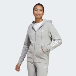 Bluza damska adidas Essentials Linear Full-Zip French Terry Hoodie. Białe bluzy damskie Adidas, xs, bez wzorów, z dresówki, z kapturem. Za 222.00 zł.