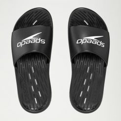 Klapki basenowe antypoślizgowe damskie Speedo Slides. Czarne klapki damskie Speedo, bez wzorów, z materiału, bez obcasa, bez zapięcia. Za 68.59 zł.