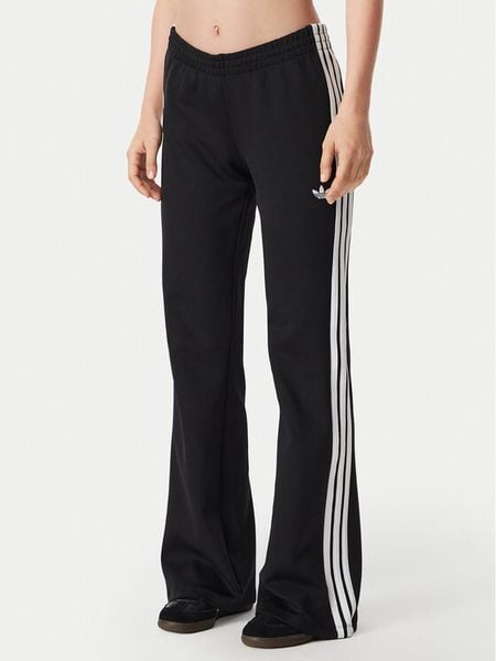 Adidas Spodnie dresowe 3S Flared KQ6424 Czarny Regular Fit. Czarne spodnie dresowe damskie Adidas, s, bez wzorów, z dresówki. Za 329.99 zł.