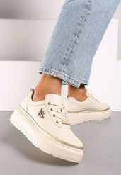 Beżowe Sneakersy ze Skóry Naturalnej na Platformie Ozdobione Metaliczną Aplikacją Nerinae. Brązowe obuwie sportowe damskie Renee, z jeansu, bez zapięcia. Za 189.99 zł.