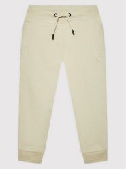 Guess Spodnie dresowe L2YQ46 KAIJ1 Beżowy Regular Fit. Brązowe spodnie dresowe chłopięce Guess, z bawełny. Za 189.99 zł.