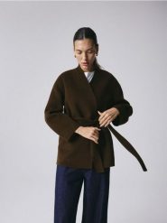 Wełniany płaszcz handmade - oliwkowy. Zielone płaszcze damskie Reserved, l, bez wzorów, z wełny, bez kaptura. Za 499.99 zł.