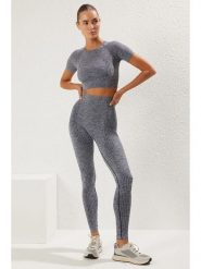 Trendyol Legginsy sportowe w kolorze szarym rozmiar: M/L. Szare legginsy damskie Trendyol, l, bez wzorów, prążkowane. Za 56.93 zł.