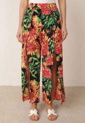 Czarno-Zielone Letnie Spodnie Casual w Kwiatowy Wzór z Rozcięciami w Nogawkach Parthena. Czarne spodnie materiałowe damskie Born2be, bez wzorów, z jeansu, długie. Za 49.99 zł.