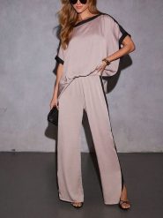 Milan Kiss Spodnie w kolorze beżowym rozmiar: M. Brązowe spodnie materiałowe damskie Milan Kiss, bez wzorów, z materiału. Za 183.15 zł.