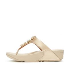 Klapki z platformą z palcem u nogi damskie FitFlop Lulu Ultra-Jewel Metallic. Szare klapki damskie FIT FLOP, bez wzorów, z materiału, bez obcasa, na koturnie, bez zapięcia. Za 596.50 zł.