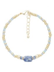 U.S. Polo Assn. Pozłacana bransoletka z kocim okiem i apatytem rozmiar: onesize. Niebieskie bransoletki damskie U.S. Polo Assn., metalowe. Za 73.99 zł.