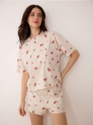 Bawełniana piżama dwuczęściowa - kremowy. Białe piżamy damskie Reserved, bez wzorów, z bawełny, bez ramiączek. Za 59.99 zł.