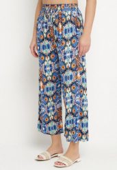 Niebieskie Spodnie Szerokie z Bawełny w Etno Print Tolivenna. Niebieskie spodnie materiałowe damskie Born2be, bez wzorów, z bawełny. Za 29.99 zł.