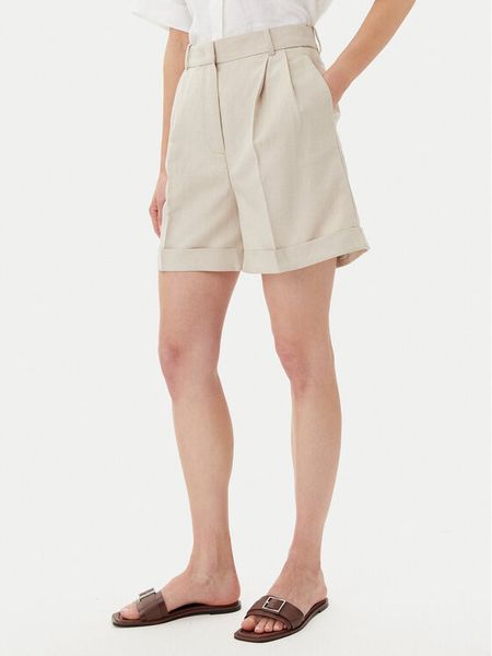 Tommy Hilfiger Szorty materiałowe WW0WW44767 Beżowy Regular Fit. Brązowe szorty damskie Tommy Hilfiger, bez wzorów, z materiału. Za 309.99 zł.