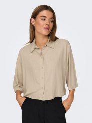 ONLY Koszulka w kolorze beżowym rozmiar: XL. Brązowe bluzki damskie Only, xl, bez wzorów, bez kołnierzyka, bez ramiączek. Za 65.85 zł.