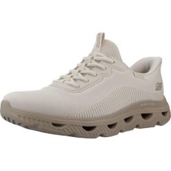 Buty SKECHERS SLIP-INS BOBS ARC WAVES Beżowy. Brązowe obuwie trekkingowe damskie Skechers, z syntetyku, bez zapięcia. Za 389.99 zł.