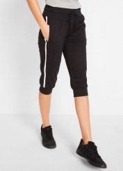 Spodnie sportowe 3/4 z bawełny. Czarne spodnie dresowe damskie bonprix, bez wzorów, z bawełny. Za 92.99 zł.