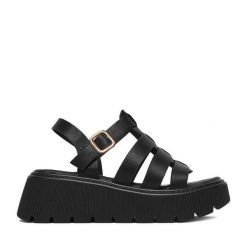 Sandały JENNY. Czarne sandały damskie Jenny, bez wzorów, bez obcasa, na płaskiej podeszwie, bez zapięcia. Za 129.99 zł.