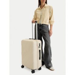 Walizka średnia Reebok. Brązowe walizki Reebok, bez wzorów, średnie. Za 319.99 zł.