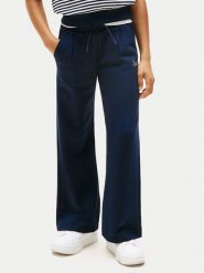 Tommy Hilfiger Spodnie dresowe Script KG0KG08669 Granatowy Wide Leg. Niebieskie spodnie dresowe dziewczęce Tommy Hilfiger, bez wzorów, z bawełny. Za 249.99 zł.