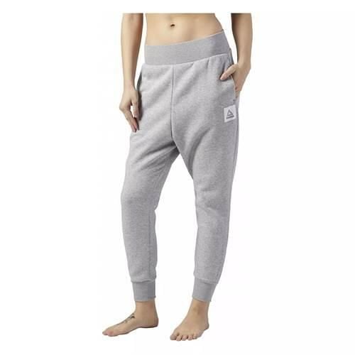 Spodnie sportowe damskie Reebok Workout. Szare spodnie dresowe damskie Reebok, m, bez wzorów, z dresówki. Za 357.00 zł.