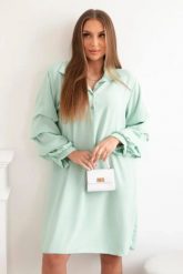 Sukienka oversize z ozdobnym rękawem jasno miętowa. Zielone sukienki damskie Włoski, bez wzorów, z elastanu, eleganckie, bez ramiączek. Za 133.82 zł.