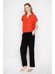 Le Jardin du Lin Bluzka w kolorze pomarańczowym rozmiar: 40. Pomarańczowe bluzki damskie Le jardin du lin, bez wzorów, bez kołnierzyka, bez ramiączek. Za 100.99 zł.