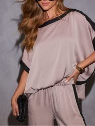 Milan Kiss Bluzka w kolorze jasnoróżowo-czarnym rozmiar: M. Różowe bluzki damskie Milan Kiss, m, bez wzorów, bez kołnierzyka, bez ramiączek. Za 126.99 zł.