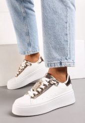 Biało-Szampańskie Sneakersy z Metaliczną Ozdobą z Cyrkoniami przy Sznurówkach Awenttes. Białe obuwie sportowe damskie Born2be, bez zapięcia. Za 49.99 zł.