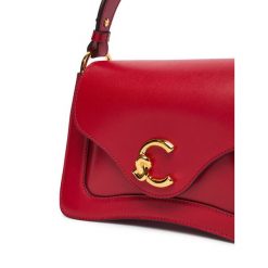 Torebka Coccinelle. Czerwone kuferki damskie Coccinelle, bez wzorów, bez dodatków. Za 1,499.00 zł.
