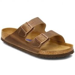 Klapki Birkenstock Arizona Tabacco. Brązowe klapki damskie Birkenstock, bez wzorów, z materiału, bez obcasa, bez zapięcia. Za 479.00 zł.