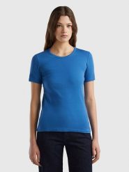 Benetton Koszulka w kolorze niebieskim rozmiar: XL. Niebieskie bluzki damskie Benetton, xl, bez wzorów, z bawełny, bez kołnierzyka, bez ramiączek. Za 48.28 zł.