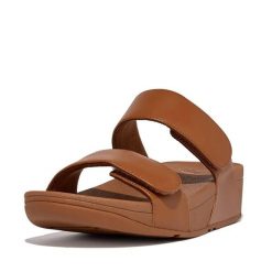 Skórzane sandały dla kobiet FitFlop Lulu Adjustable. Czarne sandały damskie Flip Flop, bez wzorów, ze skóry, bez obcasa, bez zapięcia. Za 478.50 zł.