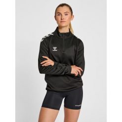 Damska bluza rozpinana 1/4 Hummel Core XK. Czarne bluzy damskie Hummel, bez wzorów, bez kaptura. Za 227.50 zł.
