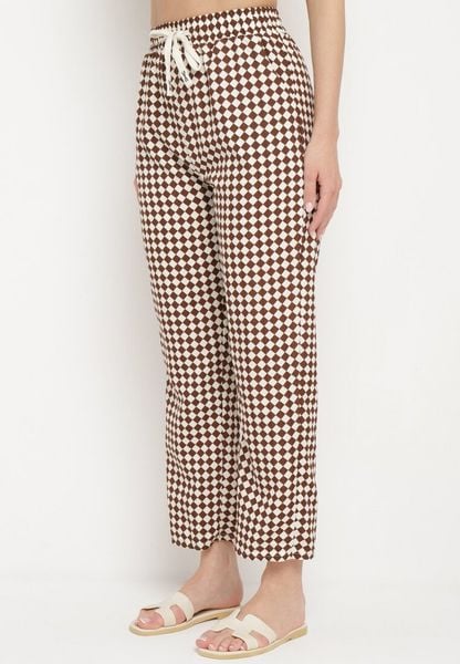 Brązowo-Beżowe Spodnie z Wysokim Stanem i Gumką w Pasie Korolla. Brązowe spodnie materiałowe damskie Born2be, z aplikacjami, z jeansu. Za 29.99 zł.