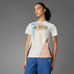 Koszulka piłkarska damska ADIDAS Hiszpania 2025 wyjazdowa. Bluzki damskie Adidas, l, bez wzorów, bez kołnierzyka, bez ramiączek. Za 459.99 zł.