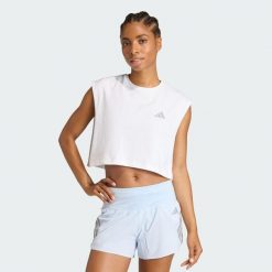 Koszulka adi365 Running Essentials Crop. Białe koszulki damskie Adidas, bez wzorów, bez kołnierzyka, bez ramiączek. Za 99.95 zł.