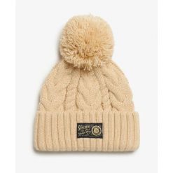 Gruba czapka w warkoczowym splocie damska Superdry. Brązowe czapki damskie Superdry, na zimę, bez wzorów, z dzianiny. Za 130.50 zł.